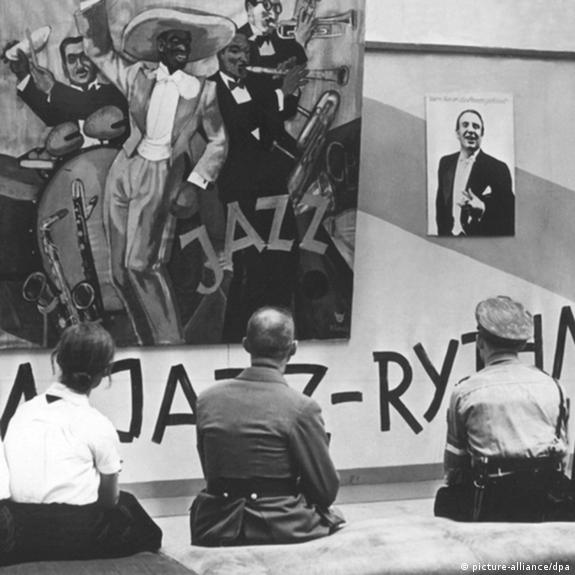 Nazis sit on bench in 'Degenerate Art' exhibition